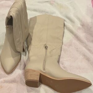 2.34 heels 16.5 leg circumference. NWT tight tan boots